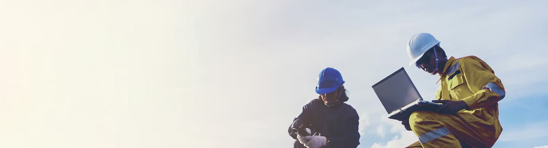 Solar panel worker at sunset